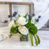 Soft as a whisper, this enchanting bouquet of white roses and alstroemeria
