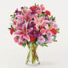 Pink lilies, carnations and spray roses will effortlessly relay your heartfelt message.