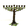 Bronze finished pewter with natural hued hand-enameling. Hand-set European crystals and glass