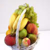Wooden basket hand-wrapped with fresh fruits selected just before delivery. Fruit variety