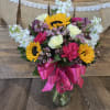 This bright and cheery arrangement will brighten anyone&rsquo;s day!