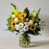 The Hello Sunshine Bouquet features the radiant beauty of sunflowers, white daisies