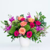 Radiance in vase - a stunning gathering of our most vibrant blooms.