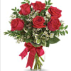 Beautiful red roses decorated with ribbon is always a great way to