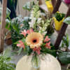 A small garden vase filled with bright blooms.

*Colors may vary based on