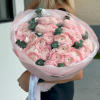 A breathtaking bouquet of blush pink ranunculus, each bloom delicately layered like