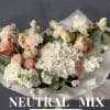 A light and airy pastel bouquet designed by our florist with seasonal