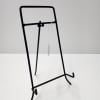 A medium to large easel stand to display a sympathy plaque.