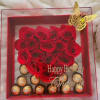 A luxurious heart-shaped arrangement of red roses paired with Ferrero Rocher chocolates