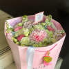 A romantic bouquet in soft pastel shades, blending lush pink hydrangeas, delicate