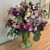 Merry Mel is a colorful and whimsical arrangement of assorted stock and
