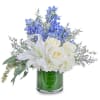 Beautiful handcrafted arrangement designed with, White Lilies, White Roses, White Hydrangeas, Blue