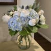 Blissful Blue is a beautiful display of roses, hydrangea, navy blue thistle
