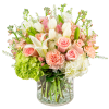 The Just Peachy is handcrafted with Peach Carnations, White Tulips, Pink Roses