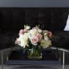 Shades of pink, soft peach and ivory reminiscent of a vintage English