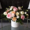 Shades of pink, soft peach and ivory reminiscent of a vintage English