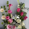 Roses, lilies, gerbers and joy wrapped in one proud. 