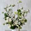 Welcome the effortless elegance and timeless beauty of our Modern Neutral Arrangement.