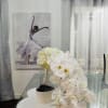 The bridal bouquet is an elegant and romantic arrangement, perfect for a