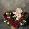 Red Roses forming a heart with fragrant oriental Lillies, filler greens and