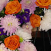 Wreath Designed with assortment of High End Seasonal Flowers &amp; Fancy Greens.