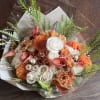 This hand wrapped bouquet full of summer&rsquo;s best blooms in all shades