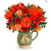Teleflora&#039;s Charming Acorn Bouquet embraces autumn. This charming glazed stoneware pitcher is