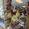 A colorful mix of high end florals and the best flowers late
