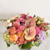 Bright and gorgeous arrangement bursting with summer colors. This will feature premium