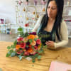 Learn the basics of floral art: handling fresh flowers, color combinations, and