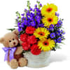 The Best Year Basket, blossoming with gerbera daisies and stock, conveys your