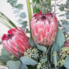Stylish piece featuring popular exotic flowers. Great for any occasion!