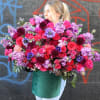 Wonderful arrangement In the box with anemones, in red and purple colors.