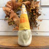 This charming medium sized candy corn themed gnome adds a touch of