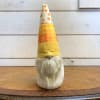 This charming medium sized candy corn themed gnome adds a touch of