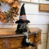 This charming old fashioned witch gnome is sure to put a spell