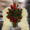 &ldquo;A breathtaking angel wing funeral arrangement crafted with delicate white chrysanthemums, symbolizing