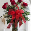 12 Stem with baby breathe and assorted greenery in a glass vase