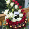 15 red roses , 7 white roses , 2 stem of white