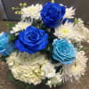 fresh white and blue flowers with hydrangeas daisies and blue roses 