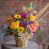 Autumn harvest wouldn&#039;t be complete without scarecrow fun. This adorable basket arrangement