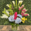 BEAUTIFUL HYDRANGEAS AND CALLA LILIES ARRANGED IN A MODERN STYLE WITH A
