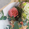 This beautiful bouquet is created with flowers in season in  soft