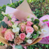 This beautiful bouquet is created with flowers in season in  soft