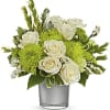 This bouquet includes white roses, green carnations, green button spray chrysanthemums, green