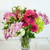 415 751 2747 
Watermelon pinks, white, and green florals in a chalice