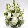 All white flowers arrangements are striking and beautiful, stoic and classic like