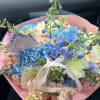 Cloud Garden
A dreamy pastel bouquet featuring sky-blue hydrangeas, soft peach spray roses