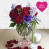 Lush, jewel-tone florals in a keepsake apothecary jar.