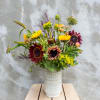 Getting inspiration from Van Gogh&#039;s sunflower portraits, this arrangement is our modern